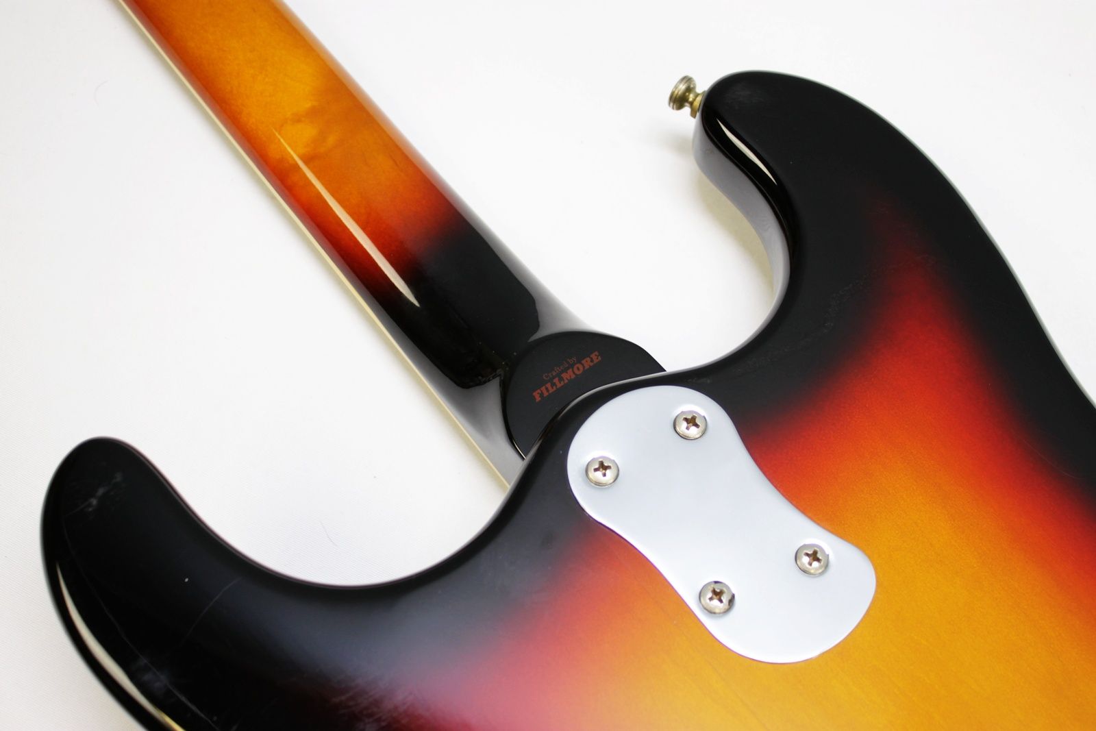 Mosrite, Ventures Model, Mk I, Fillmore, early 2000s, Sunburst, upgraded electronics, upgraded tremolo arm, vintage style guitar, offset electric guitar, surf rock guitar, collectible guitar, rare Mosrite, Japanese guitar, retro guitar, tremolo bridge, bolt-on neck, dual pickup guitar, classic sunburst finish, vintage inspired, player grade guitar, modded Mosrite, Ventures guitar, surf music, electric guitar, preowned guitar, stage ready guitar
