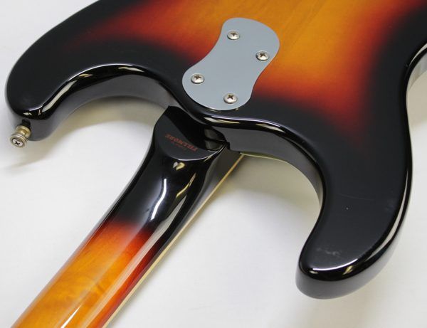 Mosrite, Ventures Model, Mk I, Fillmore, early 2000s, Sunburst, upgraded electronics, upgraded tremolo arm, vintage style guitar, offset electric guitar, surf rock guitar, collectible guitar, rare Mosrite, Japanese guitar, retro guitar, tremolo bridge, bolt-on neck, dual pickup guitar, classic sunburst finish, vintage inspired, player grade guitar, modded Mosrite, Ventures guitar, surf music, electric guitar, preowned guitar, stage ready guitar