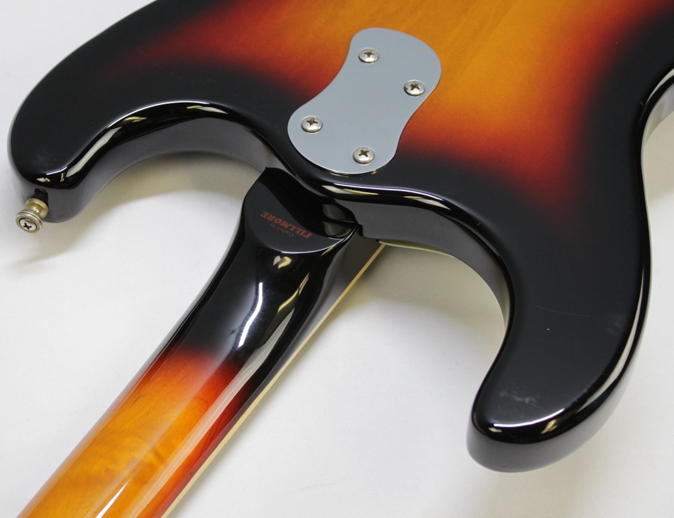 Mosrite, Ventures Model, Mk I, Fillmore, early 2000s, Sunburst, upgraded electronics, upgraded tremolo arm, vintage style guitar, offset electric guitar, surf rock guitar, collectible guitar, rare Mosrite, Japanese guitar, retro guitar, tremolo bridge, bolt-on neck, dual pickup guitar, classic sunburst finish, vintage inspired, player grade guitar, modded Mosrite, Ventures guitar, surf music, electric guitar, preowned guitar, stage ready guitar