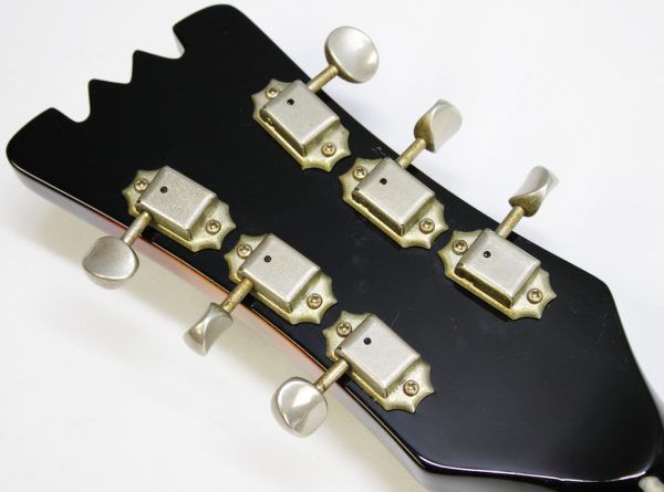Mosrite, Ventures Model, Mk I, Fillmore, early 2000s, Sunburst, upgraded electronics, upgraded tremolo arm, vintage style guitar, offset electric guitar, surf rock guitar, collectible guitar, rare Mosrite, Japanese guitar, retro guitar, tremolo bridge, bolt-on neck, dual pickup guitar, classic sunburst finish, vintage inspired, player grade guitar, modded Mosrite, Ventures guitar, surf music, electric guitar, preowned guitar, stage ready guitar