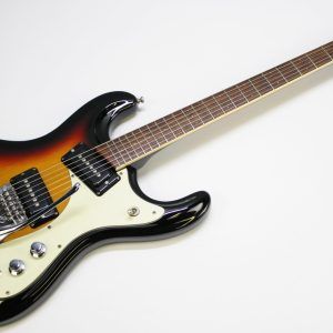 Mosrite, Ventures Model, Mk I, Fillmore, early 2000s, Sunburst, upgraded electronics, upgraded tremolo arm, vintage style guitar, offset electric guitar, surf rock guitar, collectible guitar, rare Mosrite, Japanese guitar, retro guitar, tremolo bridge, bolt-on neck, dual pickup guitar, classic sunburst finish, vintage inspired, player grade guitar, modded Mosrite, Ventures guitar, surf music, electric guitar, preowned guitar, stage ready guitar