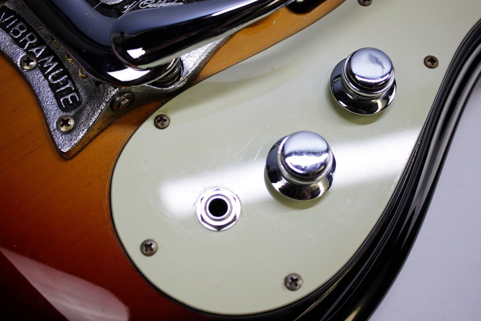 Mosrite, Ventures Model, Mk I, Fillmore, early 2000s, Sunburst, upgraded electronics, upgraded tremolo arm, vintage style guitar, offset electric guitar, surf rock guitar, collectible guitar, rare Mosrite, Japanese guitar, retro guitar, tremolo bridge, bolt-on neck, dual pickup guitar, classic sunburst finish, vintage inspired, player grade guitar, modded Mosrite, Ventures guitar, surf music, electric guitar, preowned guitar, stage ready guitar