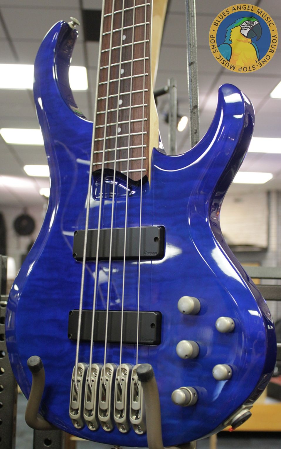 Ibanez, BTB400QM, BTB400QM-TB, Transparent Blue, 2001 Ibanez BTB400QM, 2002 Ibanez BTB400QM, Ibanez BTB bass, Ibanez bass guitar, 4-string bass, active bass, quilted maple top, basswood body, 35 inch scale, neck-through feel, BTB series, Korean made Ibanez, South Korea bass, rosewood fretboard, maple walnut neck, HH pickups, Vari-mid EQ, mono-rail bridge, blue bass guitar, transparent blue finish, extended scale bass, modern bass guitar, ergonomic bass, Ibanez Standard series, passive pickups active preamp, Gotoh tuners, BTB400QM Standard, early 2000s Ibanez bass, professional bass guitar, rock bass, metal bass, fusion bass, progressive bass