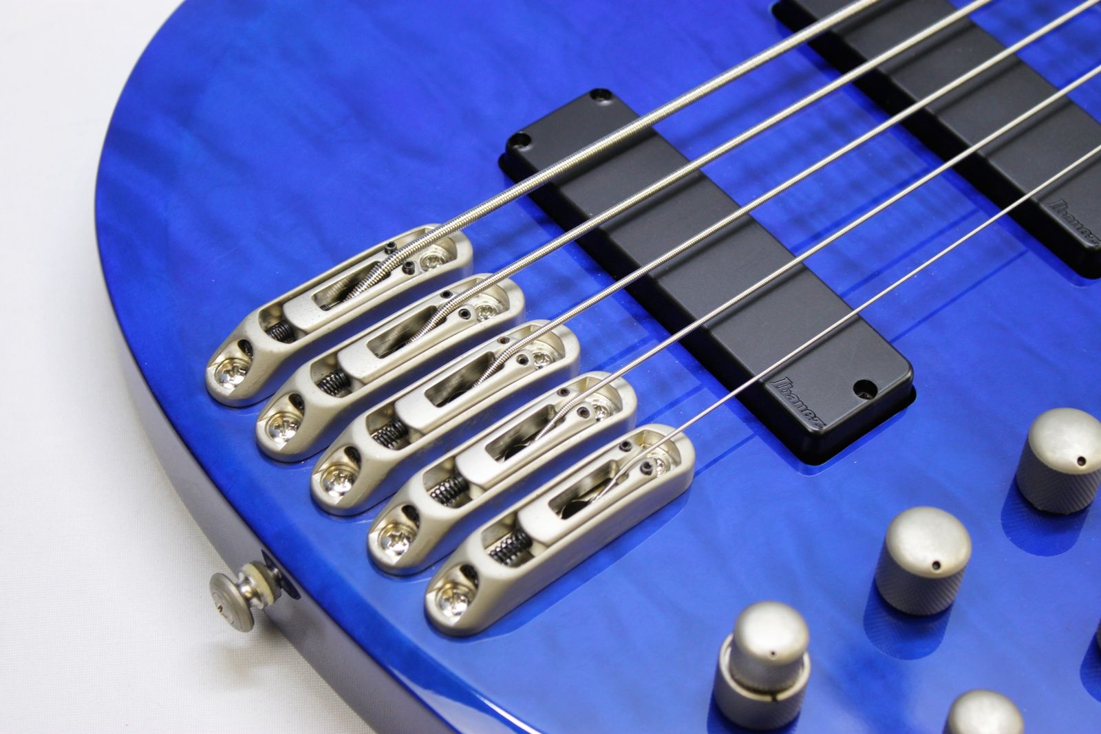 Ibanez, BTB400QM, BTB400QM-TB, Transparent Blue, 2001 Ibanez BTB400QM, 2002 Ibanez BTB400QM, Ibanez BTB bass, Ibanez bass guitar, 4-string bass, active bass, quilted maple top, basswood body, 35 inch scale, neck-through feel, BTB series, Korean made Ibanez, South Korea bass, rosewood fretboard, maple walnut neck, HH pickups, Vari-mid EQ, mono-rail bridge, blue bass guitar, transparent blue finish, extended scale bass, modern bass guitar, ergonomic bass, Ibanez Standard series, passive pickups active preamp, Gotoh tuners, BTB400QM Standard, early 2000s Ibanez bass, professional bass guitar, rock bass, metal bass, fusion bass, progressive bass