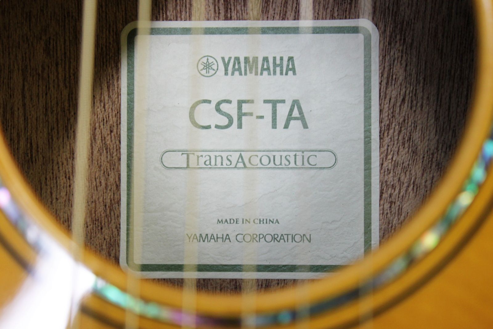 Yamaha CSF-TA VN, Yamaha CSF-TA, Yamaha TransAcoustic, Yamaha Parlor Guitar, Yamaha Acoustic Electric, CSF-TA Vintage Natural, Yamaha CSF TransAcoustic, Parlor Acoustic Guitar, Compact Acoustic Guitar, Sitka Spruce Top, Mahogany Back and Sides, Rosewood Fingerboard, System 70 TransAcoustic, SRT Piezo Pickup, Vintage Gloss Finish, Yamaha Acoustic Guitar, 6 String Acoustic, Travel Acoustic Guitar, Small Body Acoustic Guitar, Acoustic Electric Guitar, Elixir Strings, Yamaha CSF Series, Natural Finish Acoustic, Steel String Acoustic, Gig Bag Included