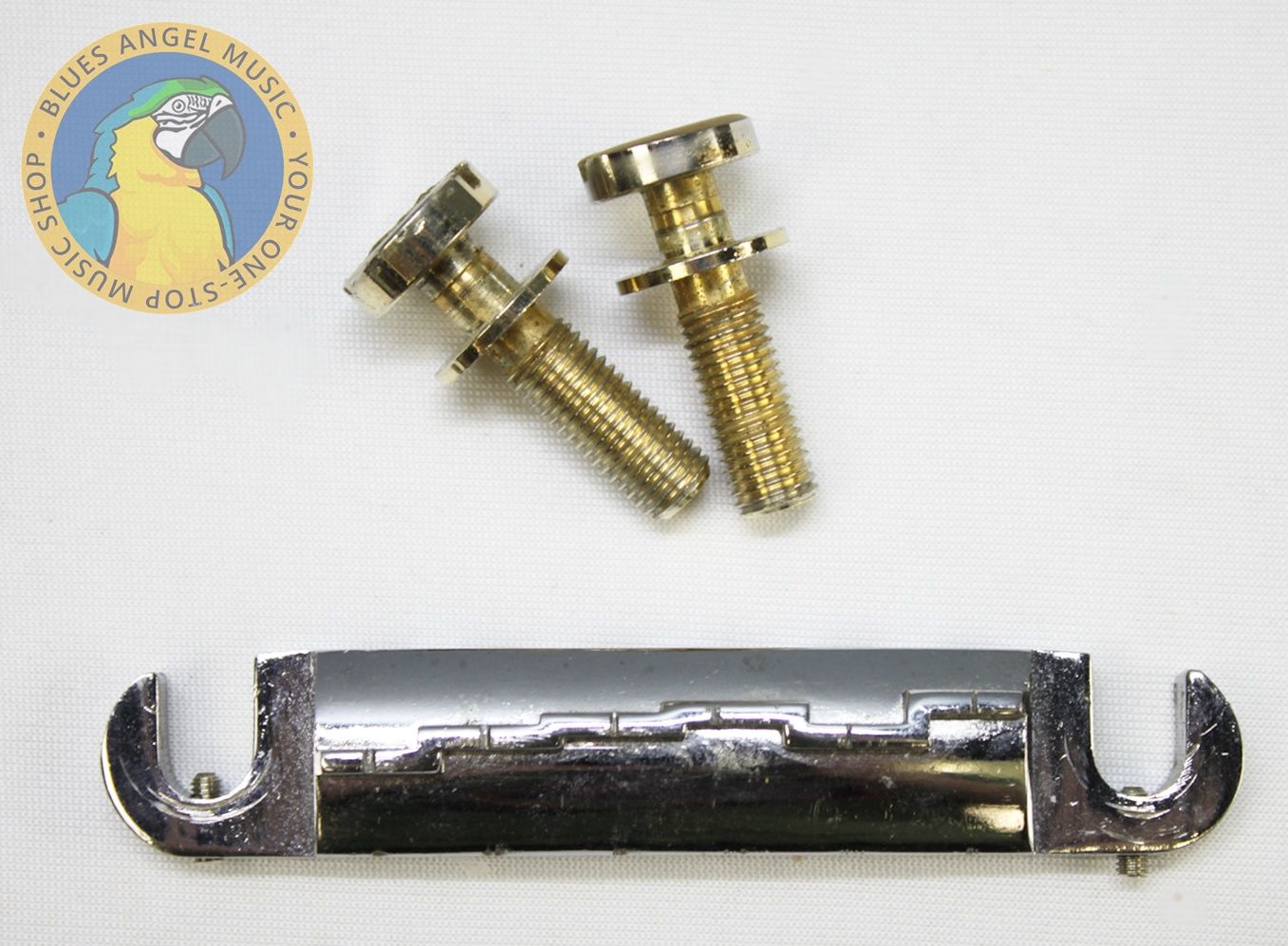 Ibanez Wrap-Around Bridge, Ibanez Bridge, Vintage Ibanez Bridge, 1970s Ibanez Parts, 70s Ibanez Hardware, Wraparound Tailpiece, Wrap Around Bridge, Gibson Melody Maker Style Bridge, Melody Maker Bridge, Vintage Guitar Bridge, Electric Guitar Bridge, Replacement Bridge, Guitar Hardware, Made in Japan Guitar Parts, MIJ Guitar Parts, Ibanez Vintage Hardware, Vintage Guitar Parts, Guitar Restoration Parts, Guitar Repair Parts, Wraparound Bridge Tailpiece, Classic Guitar Bridge, Rare Ibanez Part, Vintage MIJ Hardware, Ibanez Restoration, 1970s Guitar Hardware, Collectible Guitar Parts, Original Ibanez Part, Vintage Electric Guitar Parts, Guitar Upgrade, Luthier Parts, Bridge Assembly, Six String Guitar Bridge, Retro Guitar Hardware, Japan Vintage Guitar Parts, Ibanez Replacement Part, Vintage Wraparound Bridge, Gibson Style Bridge, Melody Maker Style Tailpiece, Guitar Bridge Upgrade, Vintage Instrument Parts, Ibanez Collectors Part