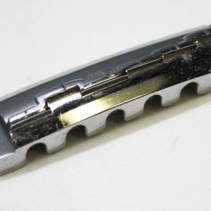 Ibanez Wrap-Around Bridge, Ibanez Bridge, Vintage Ibanez Bridge, 1970s Ibanez Parts, 70s Ibanez Hardware, Wraparound Tailpiece, Wrap Around Bridge, Gibson Melody Maker Style Bridge, Melody Maker Bridge, Vintage Guitar Bridge, Electric Guitar Bridge, Replacement Bridge, Guitar Hardware, Made in Japan Guitar Parts, MIJ Guitar Parts, Ibanez Vintage Hardware, Vintage Guitar Parts, Guitar Restoration Parts, Guitar Repair Parts, Wraparound Bridge Tailpiece, Classic Guitar Bridge, Rare Ibanez Part, Vintage MIJ Hardware, Ibanez Restoration, 1970s Guitar Hardware, Collectible Guitar Parts, Original Ibanez Part, Vintage Electric Guitar Parts, Guitar Upgrade, Luthier Parts, Bridge Assembly, Six String Guitar Bridge, Retro Guitar Hardware, Japan Vintage Guitar Parts, Ibanez Replacement Part, Vintage Wraparound Bridge, Gibson Style Bridge, Melody Maker Style Tailpiece, Guitar Bridge Upgrade, Vintage Instrument Parts, Ibanez Collectors Part