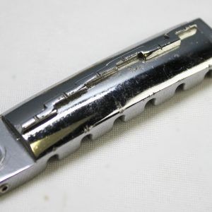 Ibanez Wrap-Around Bridge, Ibanez Bridge, Vintage Ibanez Bridge, 1970s Ibanez Parts, 70s Ibanez Hardware, Wraparound Tailpiece, Wrap Around Bridge, Gibson Melody Maker Style Bridge, Melody Maker Bridge, Vintage Guitar Bridge, Electric Guitar Bridge, Replacement Bridge, Guitar Hardware, Made in Japan Guitar Parts, MIJ Guitar Parts, Ibanez Vintage Hardware, Vintage Guitar Parts, Guitar Restoration Parts, Guitar Repair Parts, Wraparound Bridge Tailpiece, Classic Guitar Bridge, Rare Ibanez Part, Vintage MIJ Hardware, Ibanez Restoration, 1970s Guitar Hardware, Collectible Guitar Parts, Original Ibanez Part, Vintage Electric Guitar Parts, Guitar Upgrade, Luthier Parts, Bridge Assembly, Six String Guitar Bridge, Retro Guitar Hardware, Japan Vintage Guitar Parts, Ibanez Replacement Part, Vintage Wraparound Bridge, Gibson Style Bridge, Melody Maker Style Tailpiece, Guitar Bridge Upgrade, Vintage Instrument Parts, Ibanez Collectors Part