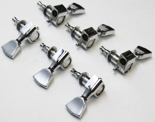 Schaller tuners, Schaller 3x3 tuners, Schaller tuning machines, Schaller guitar tuners, vintage Schaller tuners, 1970s Schaller tuners, 70s Schaller tuners, chrome guitar tuners, chrome Schaller tuners, Gibson Les Paul tuners, Gibson Les Paul Deluxe parts, 1977 Gibson Les Paul Deluxe Pro, Les Paul Deluxe Pro parts, vintage Gibson hardware, guitar tuner set, 3x3 tuner set, vintage guitar tuners, Schaller machine heads, Gibson replacement tuners, made in Germany tuners, vintage guitar parts, electric guitar hardware, Les Paul restoration parts, OEM Gibson tuners, nickel chrome tuners, guitar tuning keys, Schaller M6 tuners, vintage Schaller M6, Gibson tuner upgrade, collectible guitar parts