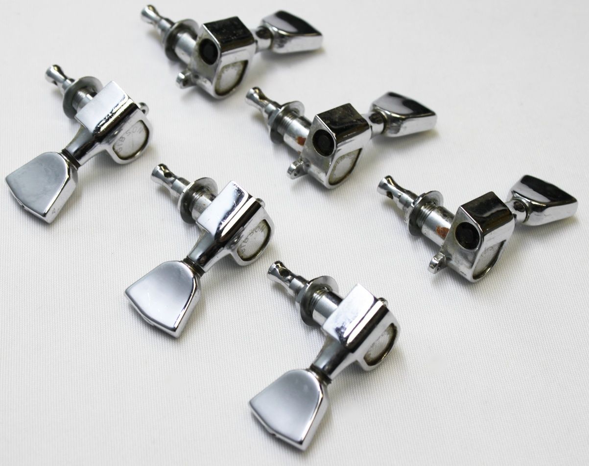 Schaller tuners, Schaller 3x3 tuners, Schaller tuning machines, Schaller guitar tuners, vintage Schaller tuners, 1970s Schaller tuners, 70s Schaller tuners, chrome guitar tuners, chrome Schaller tuners, Gibson Les Paul tuners, Gibson Les Paul Deluxe parts, 1977 Gibson Les Paul Deluxe Pro, Les Paul Deluxe Pro parts, vintage Gibson hardware, guitar tuner set, 3x3 tuner set, vintage guitar tuners, Schaller machine heads, Gibson replacement tuners, made in Germany tuners, vintage guitar parts, electric guitar hardware, Les Paul restoration parts, OEM Gibson tuners, nickel chrome tuners, guitar tuning keys, Schaller M6 tuners, vintage Schaller M6, Gibson tuner upgrade, collectible guitar parts