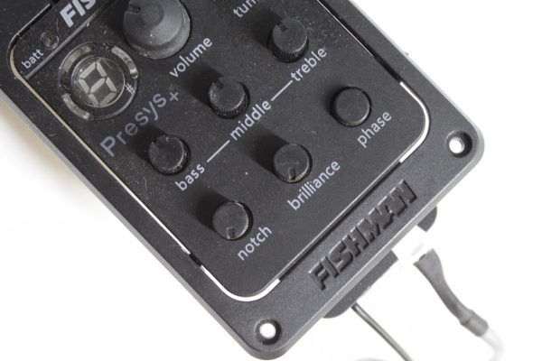 Fishman, Fishman Presys+, Fishman PRO-PSY-201, Presys Plus Preamp, Fishman Acoustic Preamp, Fishman Onboard Preamp, Acoustic Guitar Preamp, Acoustic Guitar Pickup, Fishman Pickup System, Fishman S-Core Pickup, Fishman Sonicore Pickup, Built-In Guitar Tuner, Acoustic Guitar Electronics, Onboard EQ Preamp, 3-Band EQ Preamp, Acoustic Guitar Amplification, Piezo Pickup System, Guitar Preamp System, Fishman Presys Plus Pickup, Acoustic Pickup and Preamp, Guitar Electronics Upgrade, Fishman Preamp Replacement, Acoustic Guitar Upgrade, Plug and Play Pickup System, Feedback Control Preamp, Notch Filter Preamp, Brilliance Control, Phase Switch Preamp, Acoustic Guitar Tuner System, Professional Acoustic Pickup, Fishman Acoustic Electronics, PRO-PSY-201 Pickup System, Fishman Presys Onboard System, Acoustic Instrument Preamp
