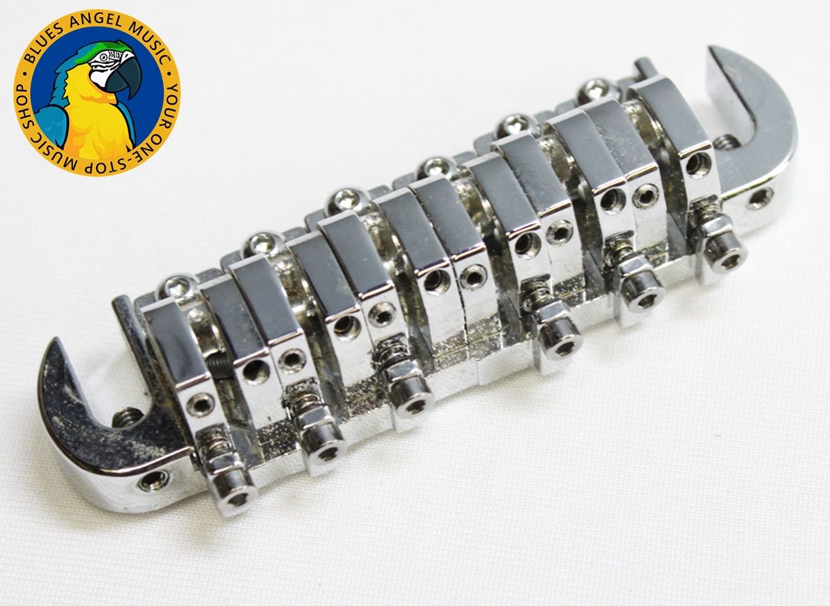 Babicz, Babicz Full Contact Hardware, Babicz FCH Bridge, Babicz Tune-O-Matic Bridge, Babicz FCH Tune-O-Matic, Chrome Tune-O-Matic Bridge, Tune-O-Matic Bridge, Guitar Bridge, Electric Guitar Bridge, Replacement Guitar Bridge, Chrome Guitar Hardware, Babicz Guitar Parts, Full Contact Hardware Bridge, FCH Bridge, Babicz Chrome Bridge, Guitar Upgrade Parts, Guitar Restoration Parts, High Performance Guitar Bridge, Precision Guitar Bridge, Sustain Enhancing Bridge, Les Paul Bridge Upgrade, Tuneomatic Replacement Bridge, Chrome Bridge Hardware, Guitar Hardware, Electric Guitar Parts, Adjustable Guitar Bridge, Babicz Replacement Parts, Full Contact Bridge System, Stop Tail Guitar Bridge, Premium Guitar Bridge, Babicz FCH Chrome Tune-O-Matic Bridge