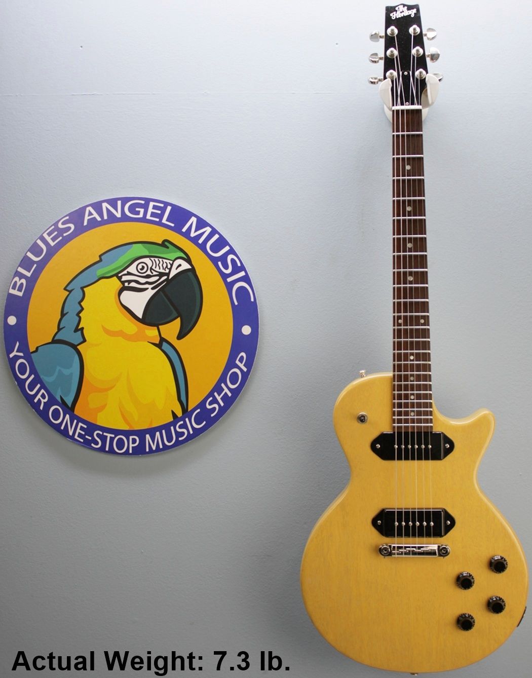 Heritage H-137, Heritage H137, H-137 guitar, Heritage guitar, solid body electric guitar, mahogany electric guitar, one-piece mahogany body, solid mahogany guitar, mahogany body guitar, American electric guitar, vintage style electric guitar, single cut electric guitar, dual pickup guitar, professional electric guitar, warm tone guitar, blues guitar, rock guitar, classic rock guitar, tone machine, Kalamazoo guitar, Heritage Guitars, USA made guitar, handcrafted electric guitar, boutique electric guitar, vintage inspired guitar, collectible guitar, premium electric guitar