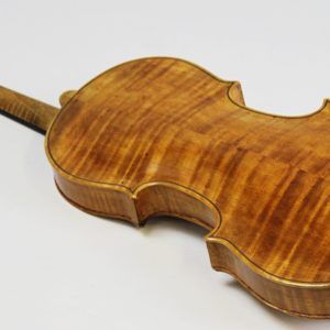 This is a beautiful Polish 4/4 Violin -- including a case & 3 bows. Reading inside the f-hole, we can see that this is a copy of a Franciszek Borowiecki from 1923. Includes Case