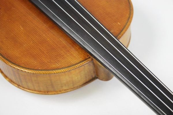 This is a beautiful Polish 4/4 Violin -- including a case & 3 bows. Reading inside the f-hole, we can see that this is a copy of a Franciszek Borowiecki from 1923. Includes Case